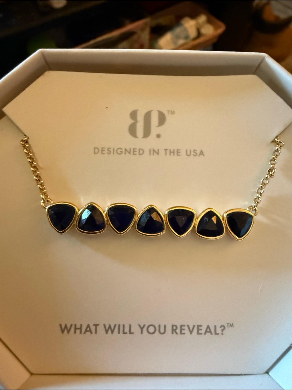 BP Gold-Tone Necklace with Dark Blue Triangular Stones